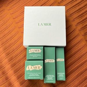 La Mer massage tool and skin care products